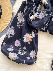 Black chiffon blouse with floral print and balloon sleeves