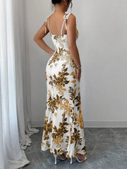 Maxi dress with floral print, tie straps, and a flattering fit.