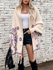 Cream Aztec fringe knit cardigan with colorful geometric pattern and open front.