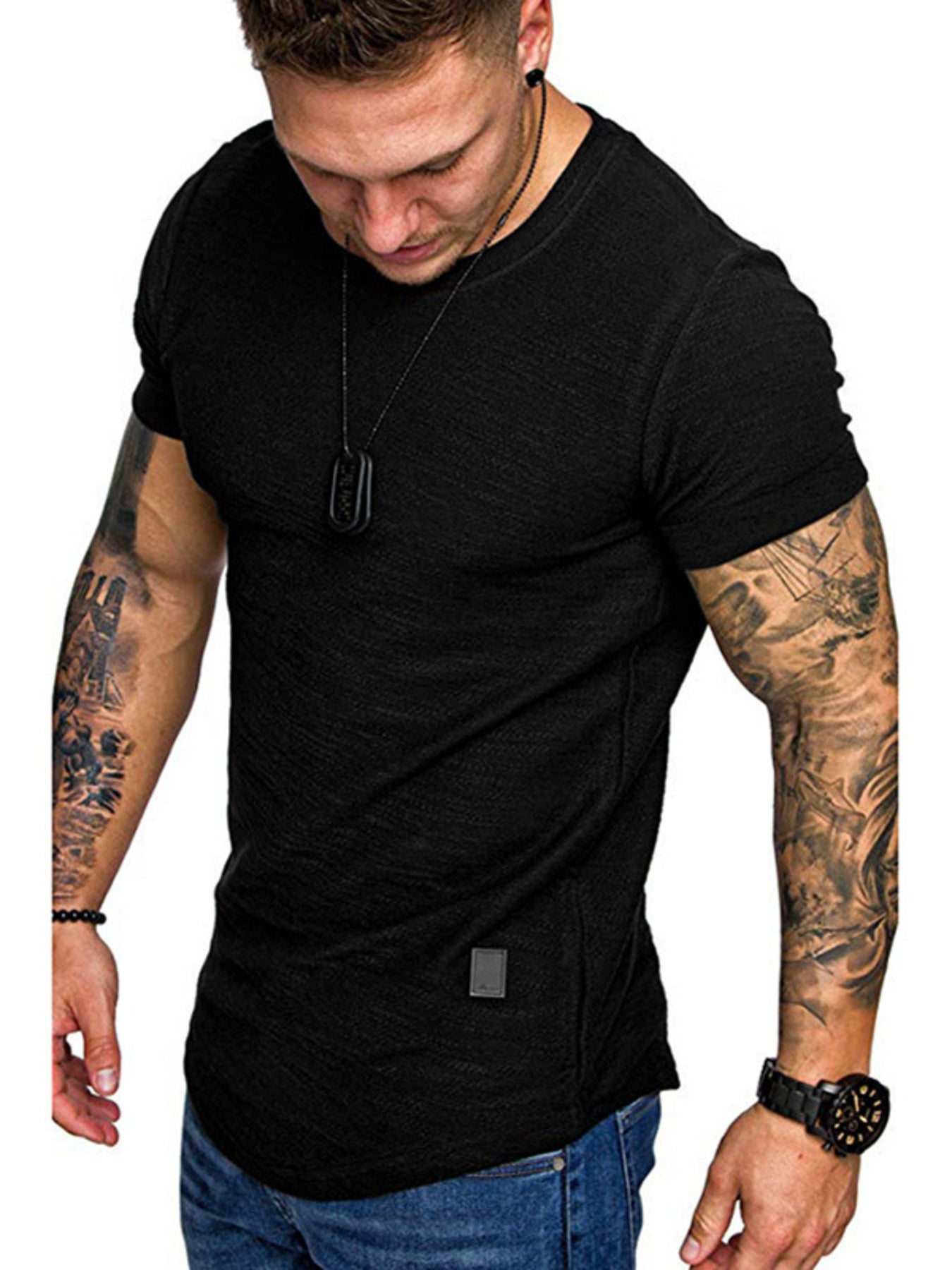 Black slim fit round neck t-shirt with textured fabric and a small logo patch.