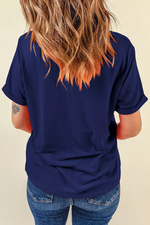 Navy cotton t-shirt with cuffed short sleeves and an eye tattoo on the arm.