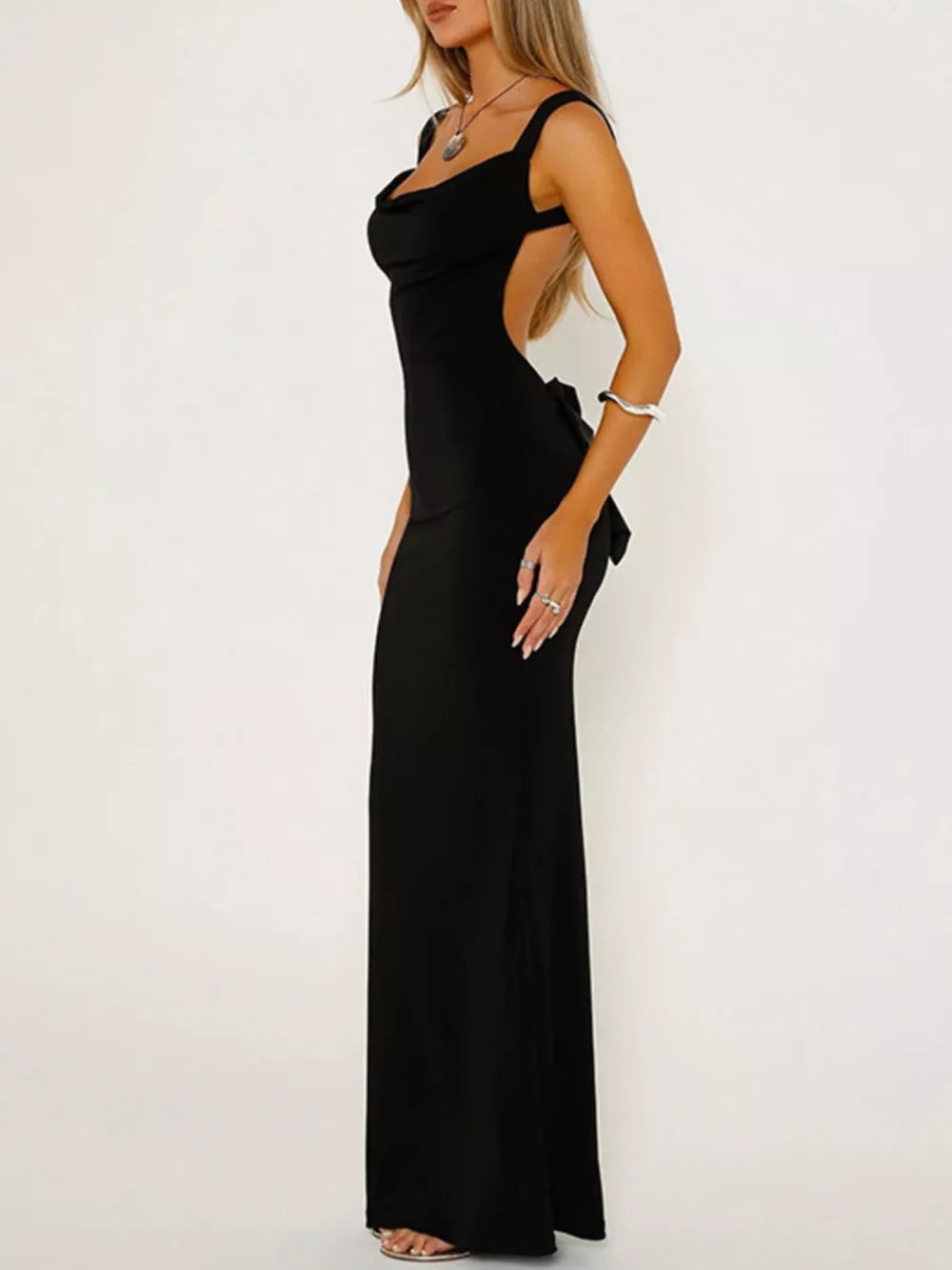 Black backless maxi dress with cowl neck and bow detail