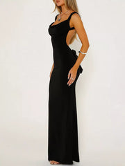 Black backless maxi dress with cowl neck and bow detail