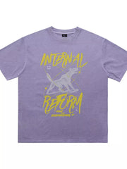 Men's light purple cotton t-shirt with a howling wolf graphic and "INTERNAL REFORM" text.
