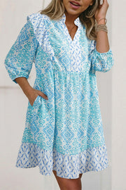 Blue patchwork ruffle mini dress with balloon sleeves and v-neck.