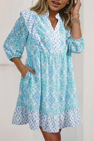 Blue patchwork ruffle mini dress with balloon sleeves and v-neck.