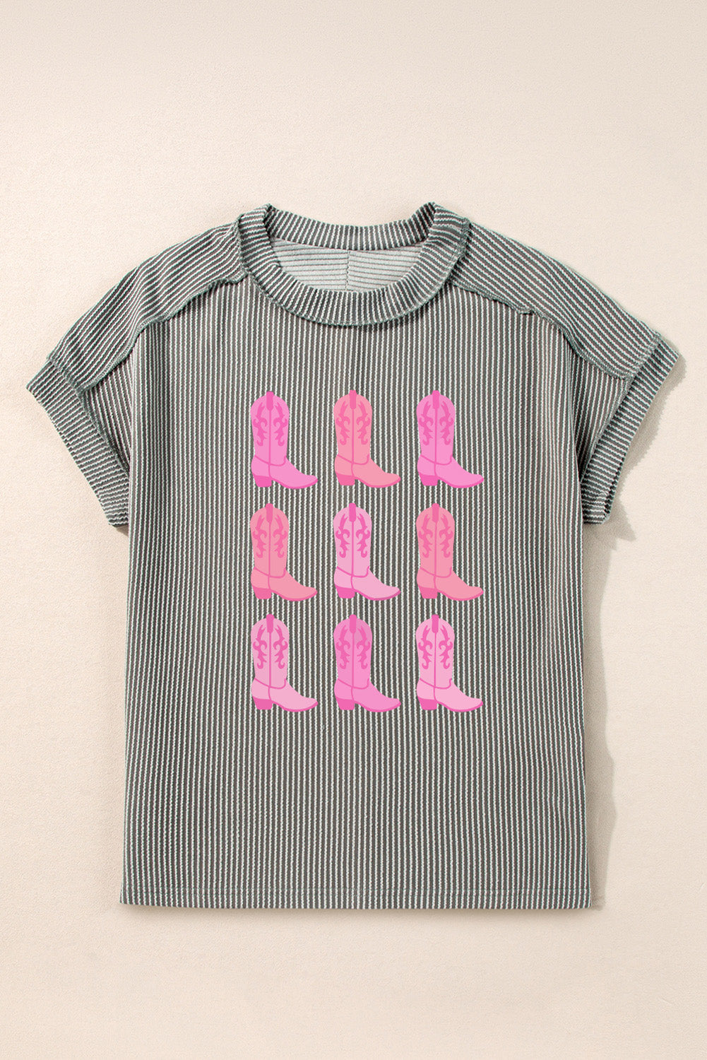 Dark gray striped t-shirt with a print of pink cowboy boots.