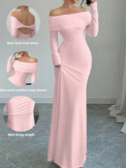 Pink off-shoulder maxi dress with long sleeves and a back twist knot detail.