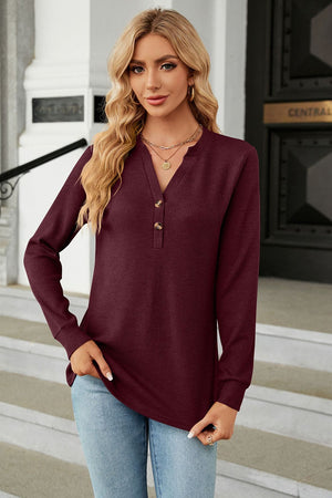 Burgundy waffle knit long sleeve henley top with button detail