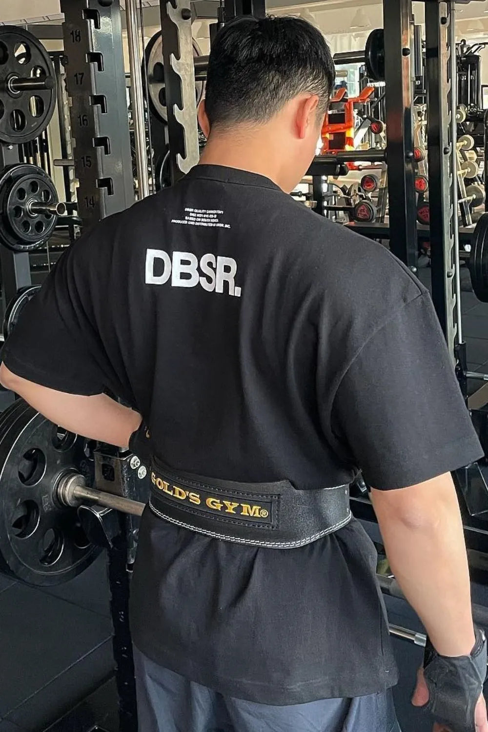 Black oversized tee with white DBSR back print and crew neck.
