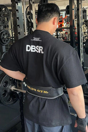 Black oversized tee with white DBSR back print and crew neck.