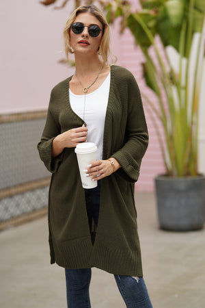 Army green textured open-front maxi knit cardigan with bell sleeves.