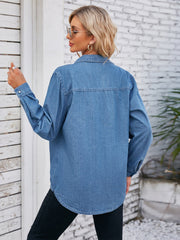 Oversized denim utility shirt in Dusty Blue with button-down front and curved hem.