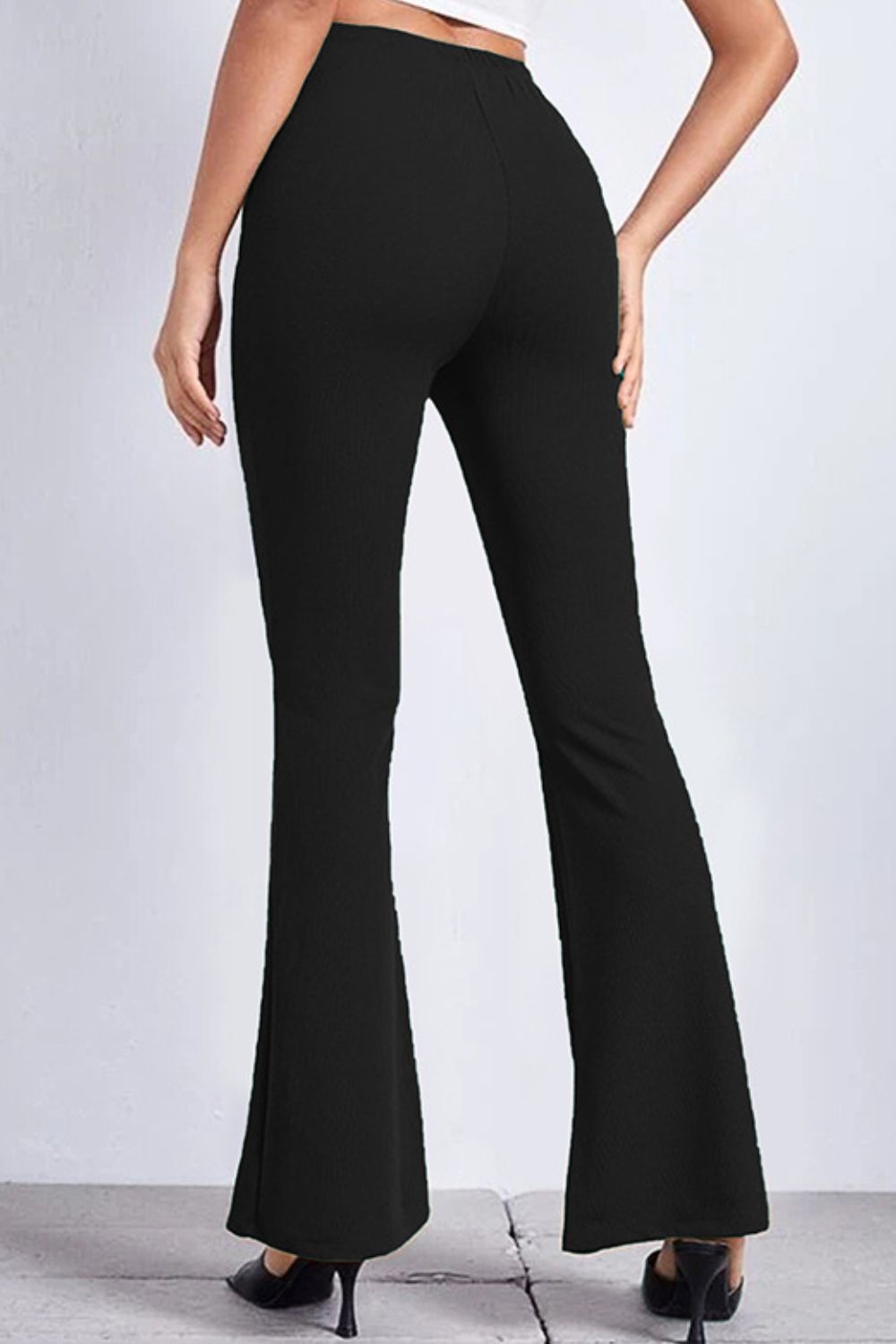 Black textured flare leggings with a comfortable fit.