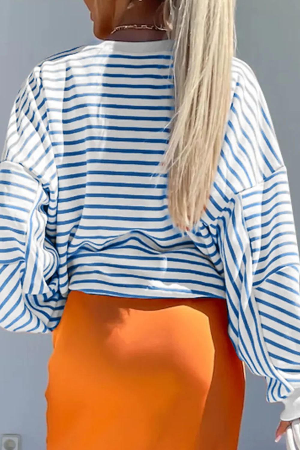 Chevron-Inset Stripe Sweatshirt in Peacock Blue with crew neck and long sleeves.