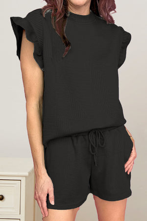Black textured loungewear set with flutter sleeves and drawstring shorts.