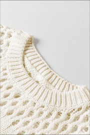 Ivory openwork knit sweater with crew neck and textured details