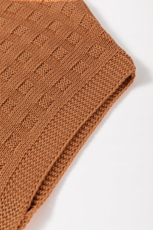 Textured knit boxy top in camel acrylic with a subtle geometric pattern.