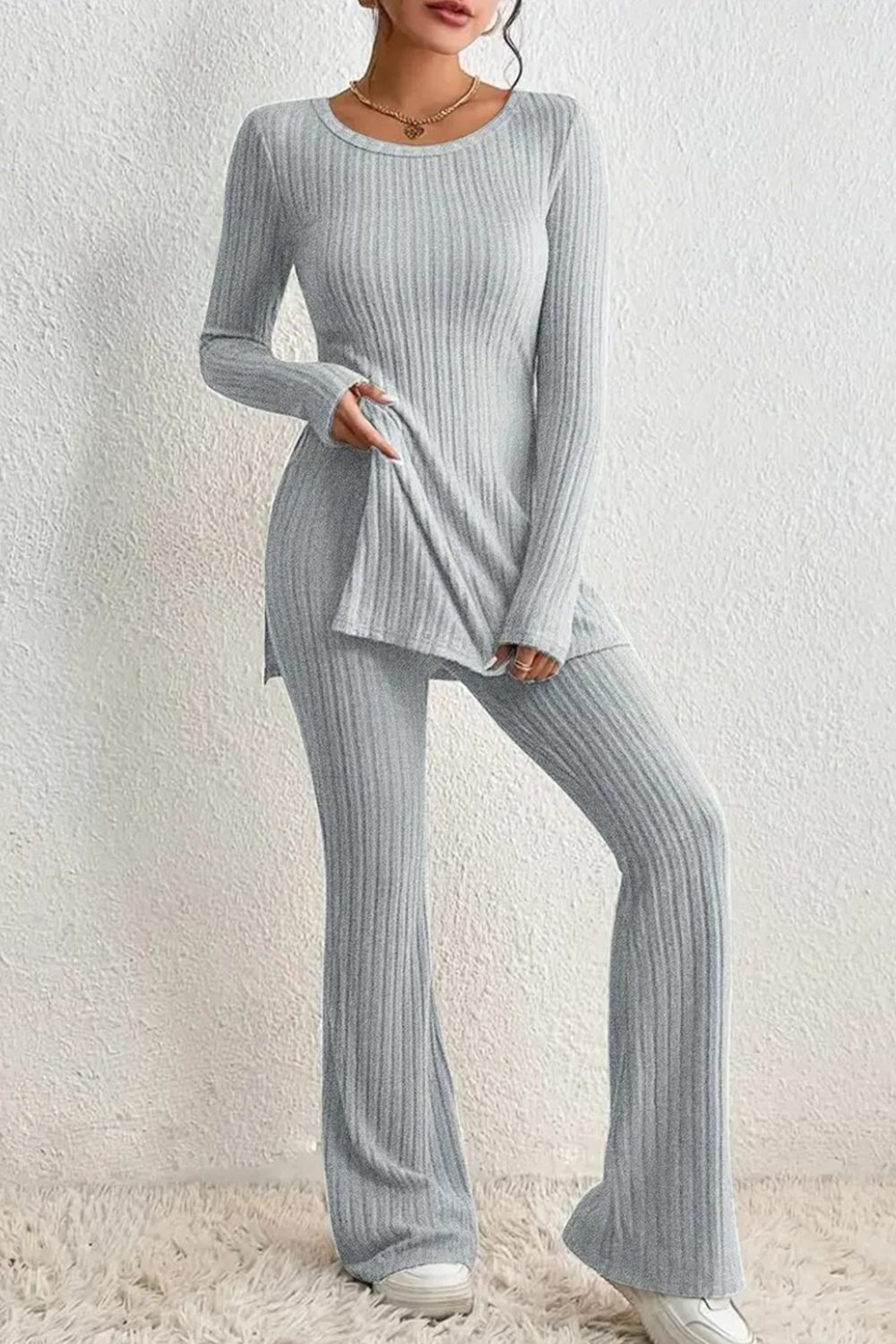 Light gray ribbed knit co-ord set with side slit top and flared pants