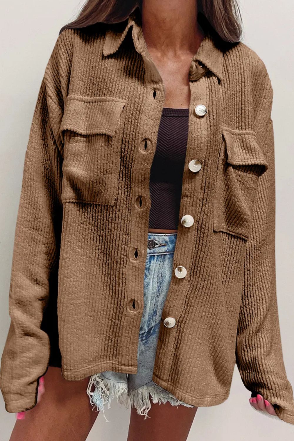 Camel textured corduroy overshirt with patch pockets and button front.