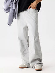 Light Gray relaxed fit cargo sweatpants for men with multiple pockets and contrast stitching.