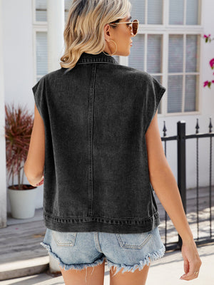 Black denim utility vest with a collar and buttoned front, shown from the back.