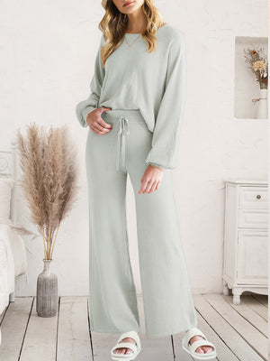Light gray acrylic wide-leg loungewear set with drawstring waist and crew neck top.