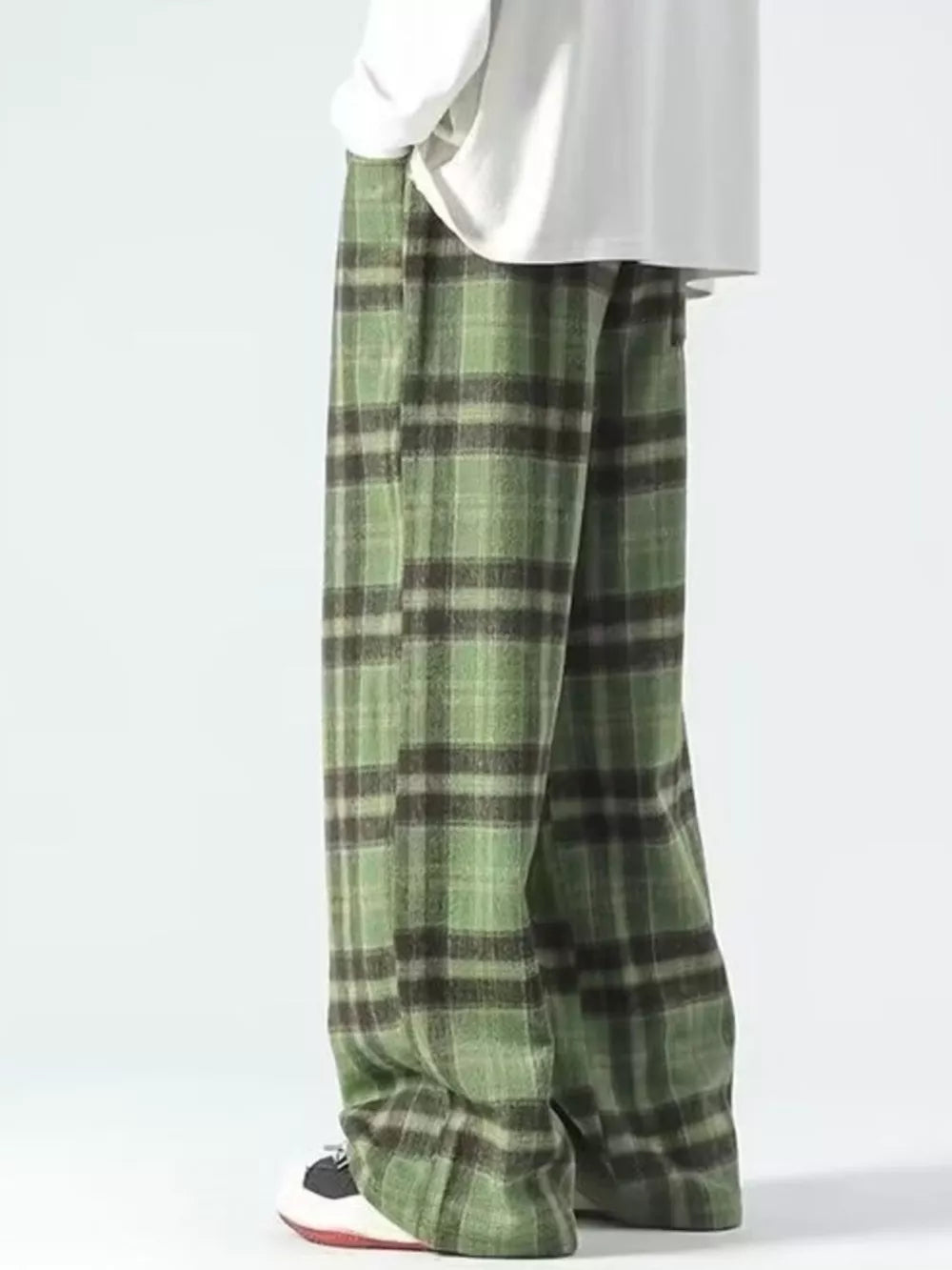 Green plaid wide-leg sweatpants with a comfortable fit.