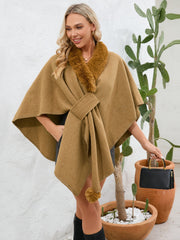 Camel faux fur collar wrap poncho with tie closure and pom-pom detail.