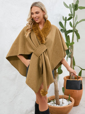 Camel faux fur collar wrap poncho with tie closure and pom-pom detail.