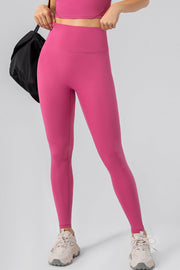 Hot Pink high-waist performance leggings with a seamless contour design.