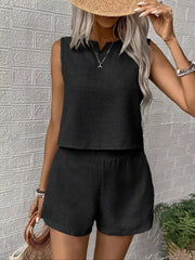 Black textured two-piece set with V-notch sleeveless top and elastic waist shorts