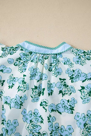 Floral print blouse with flutter sleeves and a striped collar.