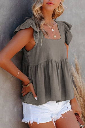 Babydoll linen top in dark gray with flutter sleeves and square neckline.