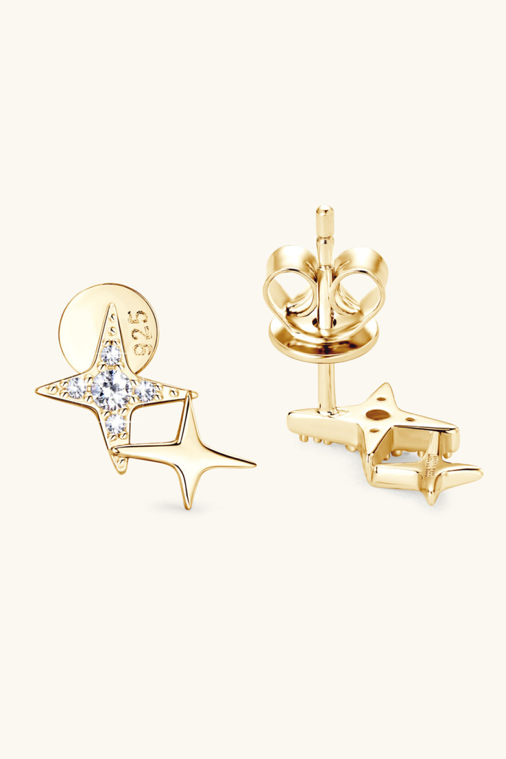 Gold celestial starburst stud earrings with clear diamonds and 925 stamp