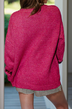 Sequin embellished knit sweater in Deep Rose with crew neck and long sleeves.