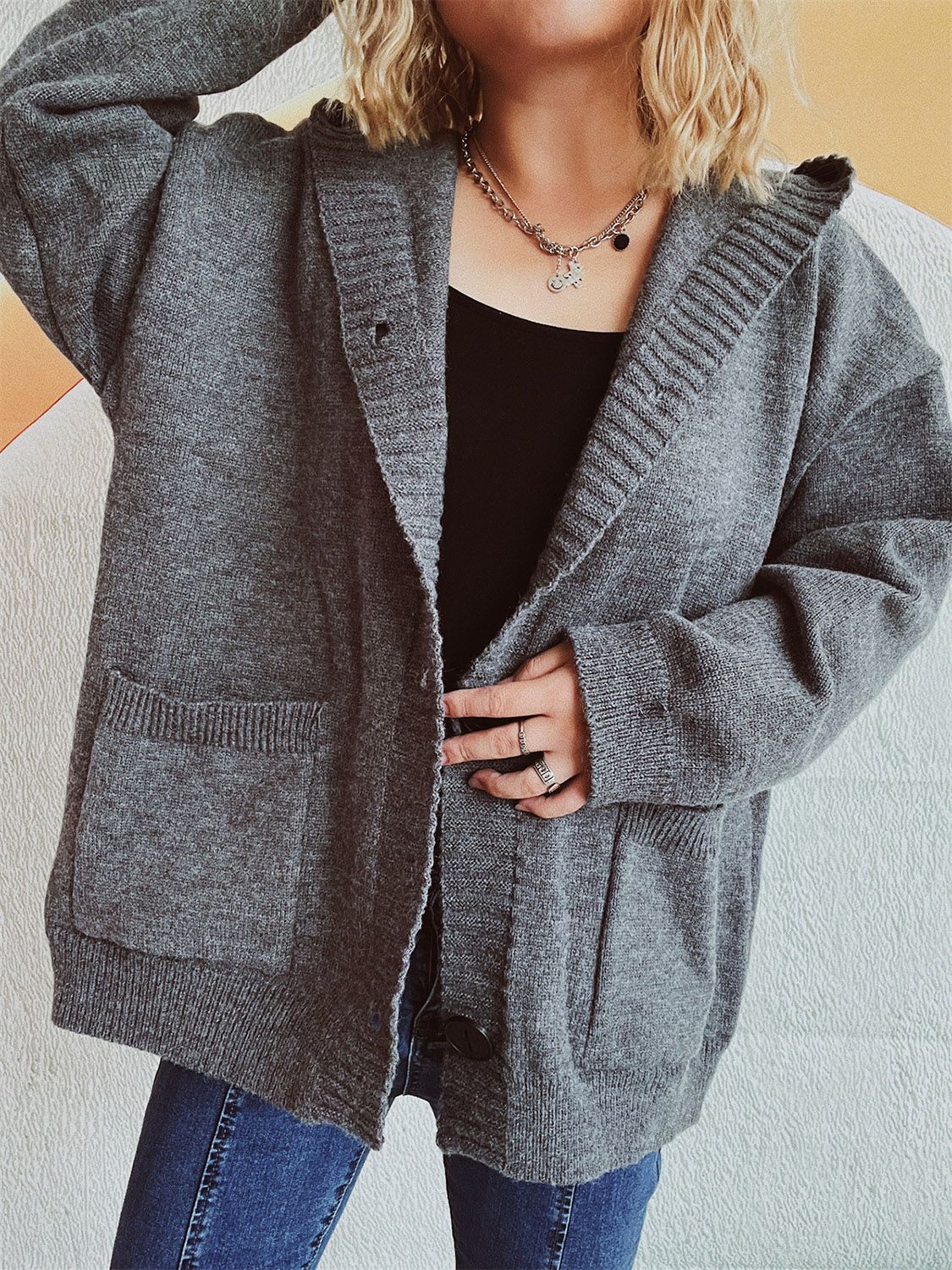 Dark gray chunky knit hooded button-down cardigan with pockets