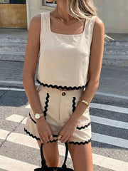 Scalloped trim tank and shorts set in cream with black trim, square neck tank, button-front shorts.
