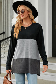 Colorblock long sleeve tee with crew neck and slit hem in black, light gray, and charcoal.