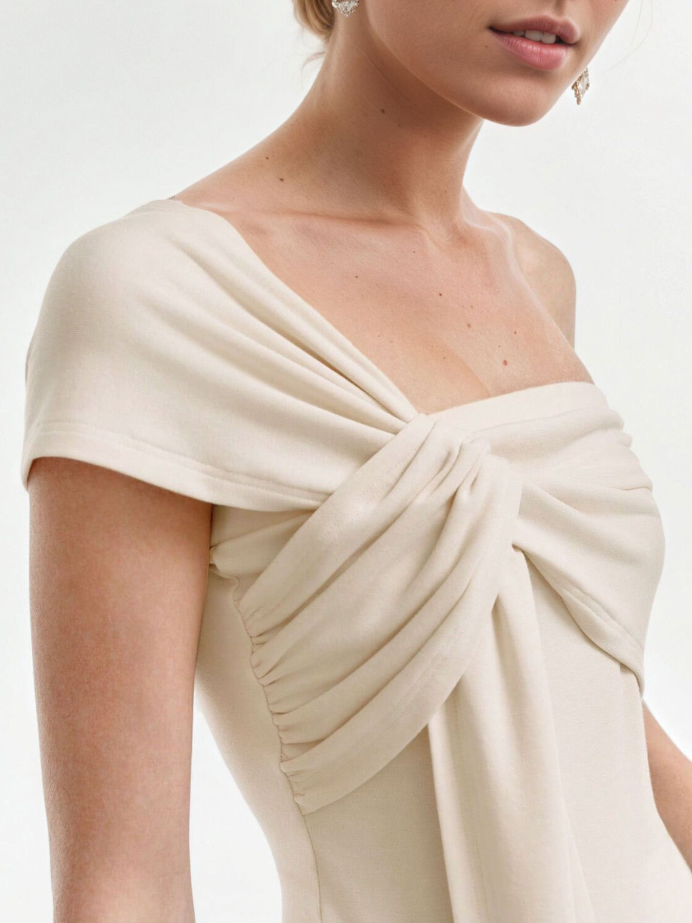 Beige asymmetrical t-shirt with knot detail and ruched side