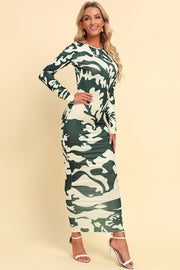 Sculpted camo backless maxi dress with long sleeves in green camouflage pattern.
