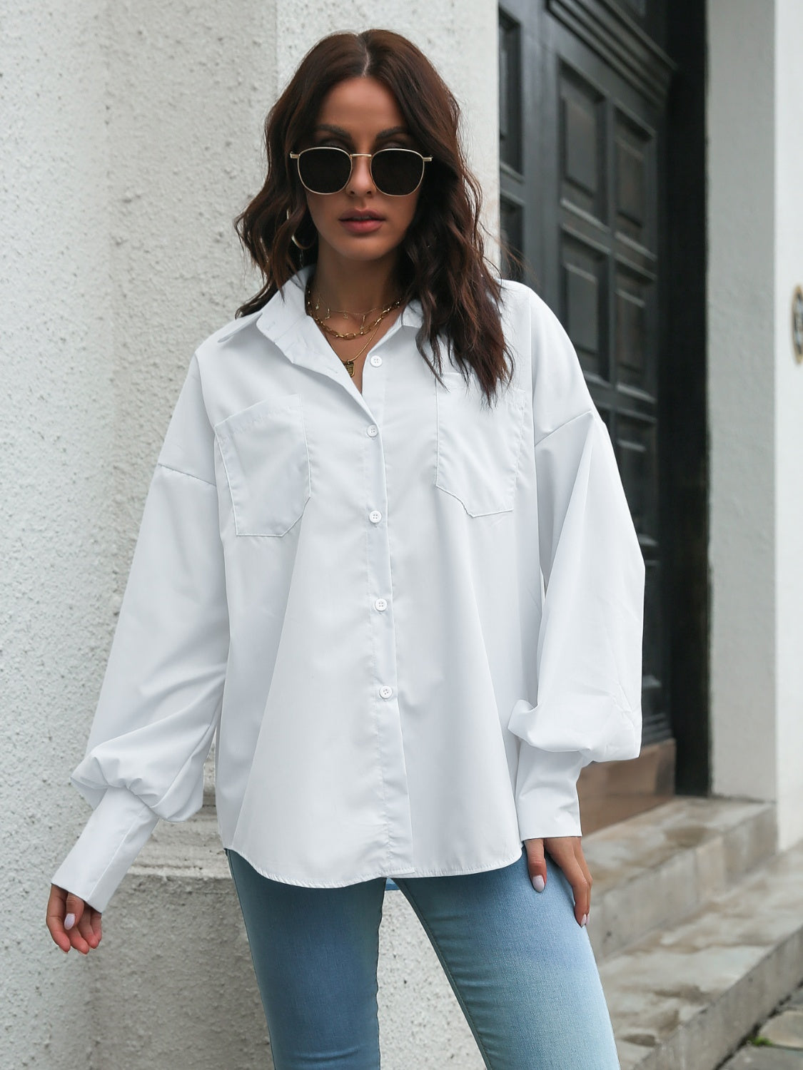 White poplin button-down shirt with balloon sleeves and two chest pockets