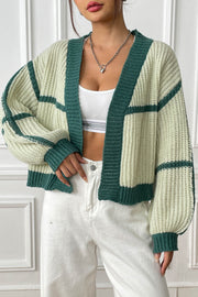 Colorblock ribbed open cardigan in cream and green with balloon sleeves and a relaxed fit.
