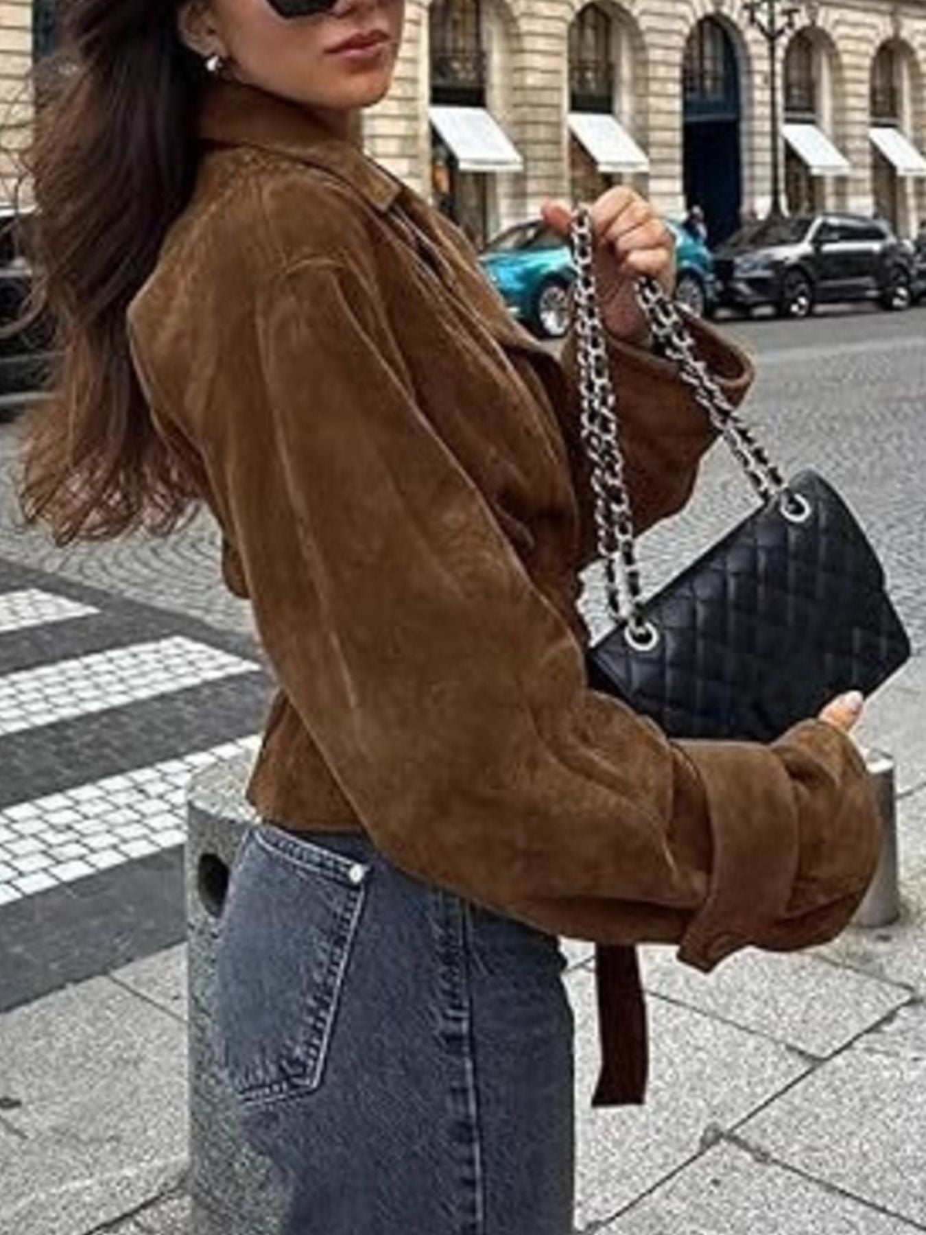 Brown faux suede bolero jacket with tie waist and wide sleeves.