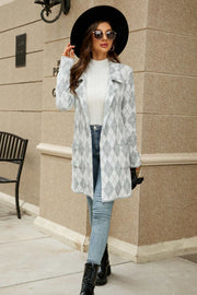 Gray grid-print knit blazer coat with pockets, styled with jeans and boots.