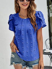 Blue textured dot puff sleeve blouse with round neckline and pintuck detail.