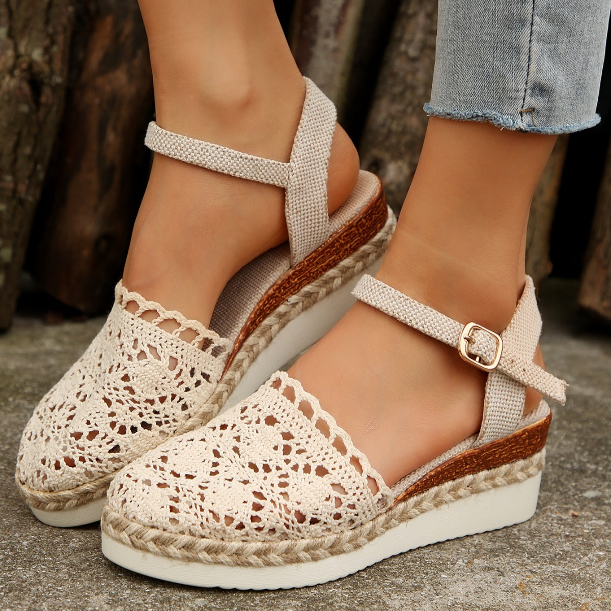 Ivory crochet espadrille sandals with ankle strap and jute sole detail.