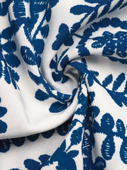 Blue and white floral print halter maxi dress fabric detail