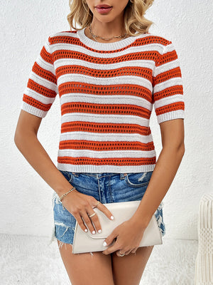 Open-knit striped crew neck top in orange and white, short sleeves, casual acrylic sweater.