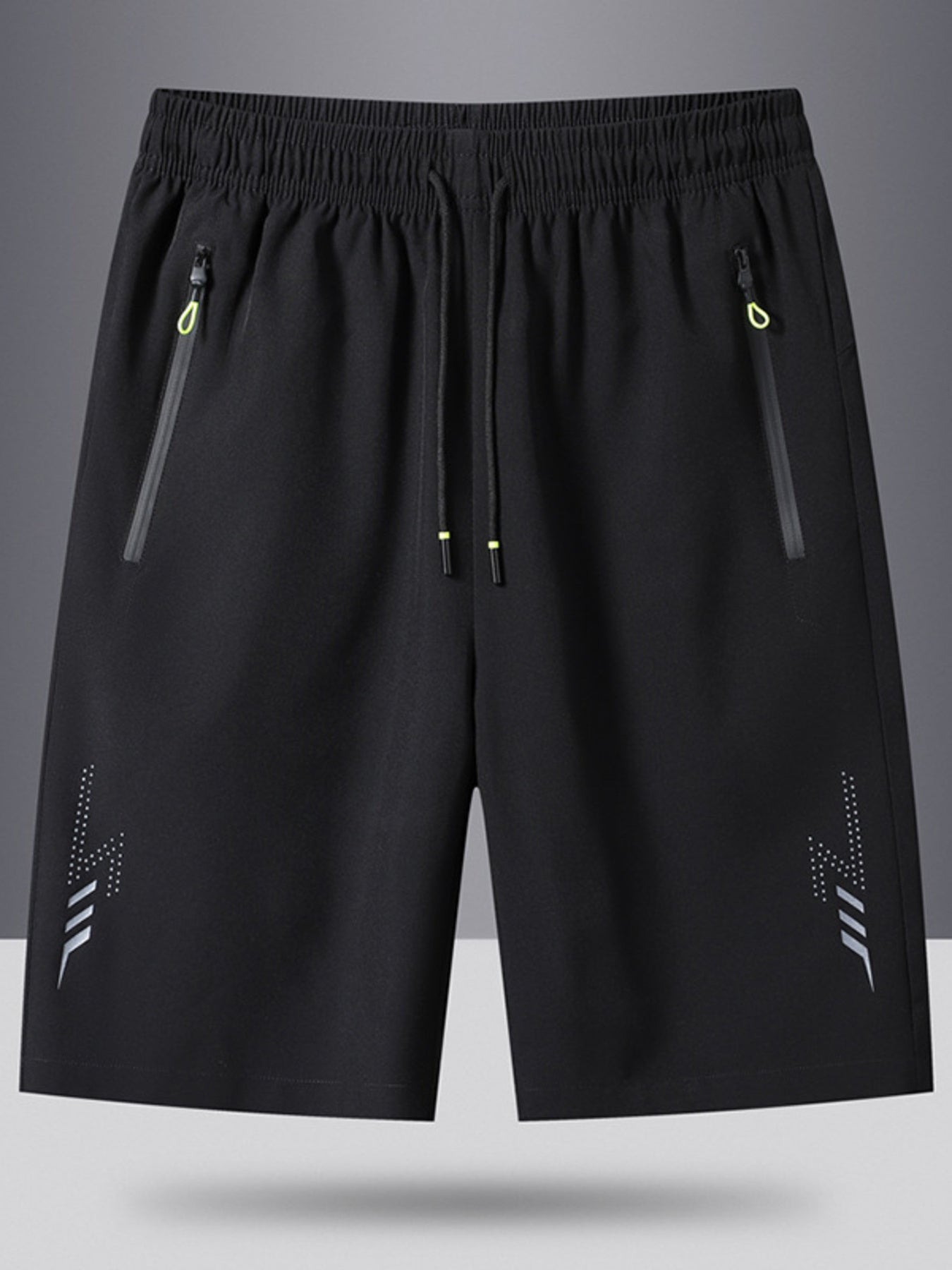 Men's black athletic shorts with drawstring, zip pockets, and reflective lightning detail.